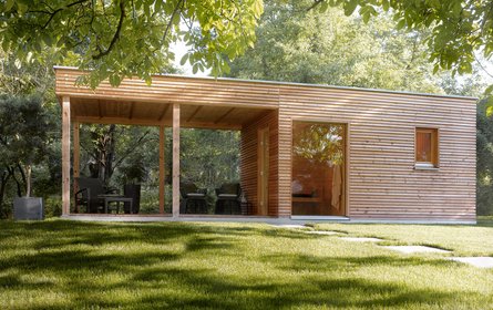 A garden sauna surrounded by natural ambience